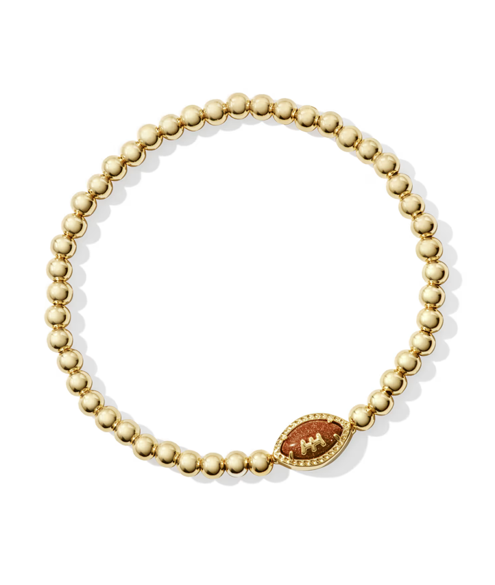 KENDRA SCOTT FOOTBALL GOLD STRETCH BRACELET IN ORANGE GOLDSTONE